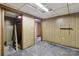 Room with wood paneled walls and view of another room at 5626 Sandhurst Rd, Hickory, NC 28602
