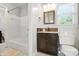 Bathroom boasts a combination shower tub, stylish vanity, and updated fixtures at 5947 Quail Hollow Rd # A, Charlotte, NC 28210