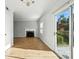 Bright dining room with hardwood floors and sliding door to the exterior at 5947 Quail Hollow Rd # A, Charlotte, NC 28210
