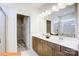 Modern bathroom featuring dual sinks, stylish vanity, and a separate shower showcasing contemporary design at 6328 Busch Way, Midland, NC 28107