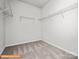 Spacious walk-in closet with ample shelving and storage solutions, maximizing organization at 6328 Busch Way, Midland, NC 28107