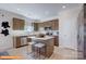 Kitchen with stainless steel appliances, island with seating, and ample cabinet space at 6328 Busch Way, Midland, NC 28107