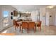 Open-concept kitchen and dining area with stainless steel appliances and seating at 6328 Busch Way, Midland, NC 28107
