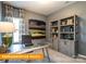 Well-lit office space with modern desk, shelving, and artwork at 6328 Busch Way, Midland, NC 28107