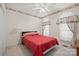 This bedroom has an area rug, is carpeted and features two windows at 7189 Bovine Ln # 28, Harrisburg, NC 28075
