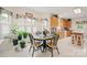 Cozy dining area filled with light from a large bay window at 7189 Bovine Ln # 28, Harrisburg, NC 28075