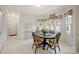 Dining area with shuttered windows, filling the space with light at 7189 Bovine Ln # 28, Harrisburg, NC 28075