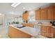 Spacious kitchen featuring wooden cabinetry and modern appliances at 7189 Bovine Ln # 28, Harrisburg, NC 28075
