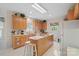 Bright, eat-in kitchen with an island and plenty of cabinet space at 7189 Bovine Ln # 28, Harrisburg, NC 28075