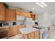 Bright kitchen with updated cabinets and an island with cooktop at 7189 Bovine Ln # 28, Harrisburg, NC 28075