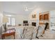 Open living room featuring vaulted ceilings and a cozy fireplace at 7189 Bovine Ln # 28, Harrisburg, NC 28075
