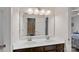 Bathroom featuring a double sink vanity with a mirror at 7339 Millstone Sw Cir, Concord, NC 28025