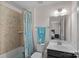 Bathroom with a tub and shower combination at 7339 Millstone Sw Cir, Concord, NC 28025