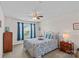 Comfortable bedroom with large window and view of neighborhood at 7339 Millstone Sw Cir, Concord, NC 28025