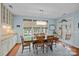 Dining area with natural light and access to the backyard at 7339 Millstone Sw Cir, Concord, NC 28025