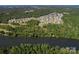 Aerial view of the community with mature trees surrounding the neighborhood at 755 Lagan Ct, Fort Mill, SC 29715
