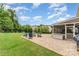 Relaxing backyard with a cozy fire pit and brick patio, perfect for entertaining at 755 Lagan Ct, Fort Mill, SC 29715