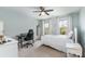 Bright bedroom featuring a desk and modern ceiling fan, creating a comfortable and functional space at 755 Lagan Ct, Fort Mill, SC 29715