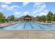 Community pool offers a large swimming area and a clubhouse with lounge chairs at 755 Lagan Ct, Fort Mill, SC 29715