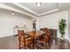 Bright dining room features wood floors, recessed lights, and a serving cabinet at 755 Lagan Ct, Fort Mill, SC 29715