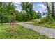 Community disc golf course with basket and gravel path at 755 Lagan Ct, Fort Mill, SC 29715