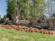 Established community entrance with brick pillars, flower beds, and landscape design at 755 Lagan Ct, Fort Mill, SC 29715