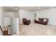 Spacious living area with neutral carpeting and ample natural light, perfect for relaxing and entertaining at 755 Lagan Ct, Fort Mill, SC 29715