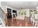 Spacious living room showcasing a fireplace, built-in shelving, and seamless transition to outdoor views at 755 Lagan Ct, Fort Mill, SC 29715