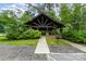 Community pavilion surrounded by lush greenery and picnic tables at 755 Lagan Ct, Fort Mill, SC 29715
