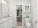 Charming bathroom with dual sinks and a view into the bright bedroom at 8108 Christmas Ct, Charlotte, NC 28216