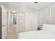 Comfortable bedroom featuring a large closet and access to the hallway at 8108 Christmas Ct, Charlotte, NC 28216