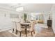 Well-lit dining area with stylish furnishings, opening up to the inviting living room at 8108 Christmas Ct, Charlotte, NC 28216