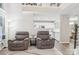 Inviting living room showcases neutral tones, comfortable seating, and an open view into the kitchen at 8108 Christmas Ct, Charlotte, NC 28216