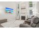 Inviting living room with a cozy fireplace, ample natural light, and comfortable seating at 8108 Christmas Ct, Charlotte, NC 28216