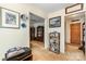 Hallway featuring classic decor, neutral tones, and doorways leading to various rooms at 839 Montford Dr, Charlotte, NC 28209