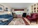 Inviting living room with ample seating, a decorative rug, and classic furnishings at 839 Montford Dr, Charlotte, NC 28209