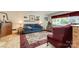 Cozy living room with a comfortable sofa, decorative rug, and lots of natural light at 839 Montford Dr, Charlotte, NC 28209