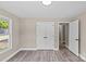 Comfortable bedroom features neutral walls, hardwood floors, and a closet at 933 Old Charlotte Rd, Concord, NC 28027