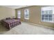 Bedroom with three bright windows at 1012 Kings Bottom Dr, Fort Mill, SC 29715