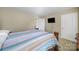 Bedroom with neutral walls and a flat screen TV at 1012 Kings Bottom Dr, Fort Mill, SC 29715