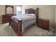 Cozy bedroom with wooden furniture and natural light at 1012 Kings Bottom Dr, Fort Mill, SC 29715