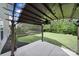View of covered patio and well-maintained lawn, perfect for outdoor entertaining at 1012 Kings Bottom Dr, Fort Mill, SC 29715
