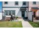 Charming outdoor patio area with seating, lush green lawn, and a private fenced yard at 1036 Riverwalk Pkwy, Rock Hill, SC 29730