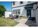 Inviting backyard patio with a cozy seating area, perfect for relaxing outdoors at 1036 Riverwalk Pkwy, Rock Hill, SC 29730