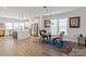 Modern kitchen with stainless steel appliances, a center island, and a dining nook at 1036 Riverwalk Pkwy, Rock Hill, SC 29730