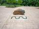 Scenic riverwalk featuring stamped concrete with the riverwalk logo and a decorative boulder at 1036 Riverwalk Pkwy, Rock Hill, SC 29730