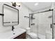 Updated bathroom featuring sleek fixtures, a modern vanity, and glass-enclosed shower at 103A N Tracy St, Kings Mountain, NC 28086