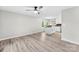 Bright living room with wood floors that flows into a kitchen and a window view at 103A N Tracy St, Kings Mountain, NC 28086