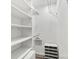 Well-organized walk-in closet with ample shelving, clothing racks, and shoe storage at 103A N Tracy St, Kings Mountain, NC 28086