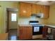 Kitchen featuring wood cabinets and appliances at 1051 S Brady Ave, Newton, NC 28658